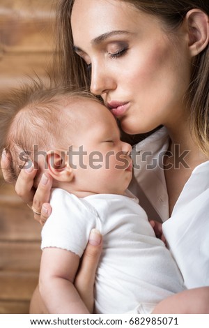 Mom with a newborn baby of two months of age