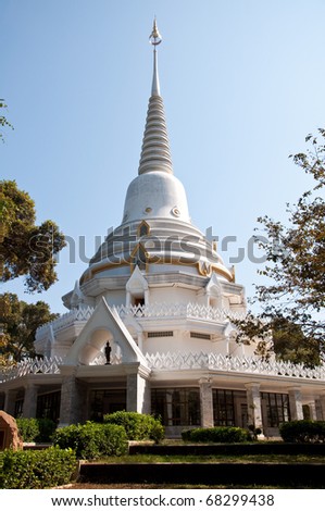 white pagoda stupa in countryside Thai
