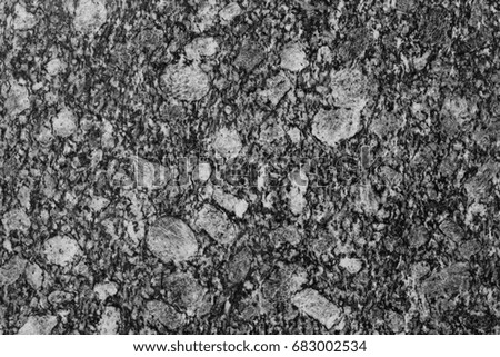 Black stone , black granite cracked  texture surface seamless pattern in black and white for background or wallpaper