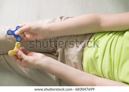 Man holding spinner. Top view Stock photos.