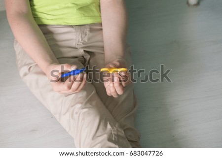 Man holding spinner. Top view Stock photos.
