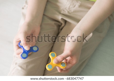 Man holding spiner. Top view Stock photos.