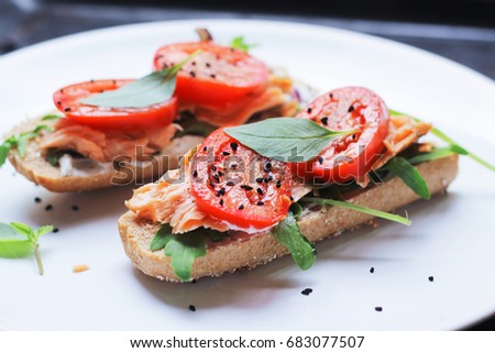 wholegrain sandwiches with salmon tomato nigella and arugula