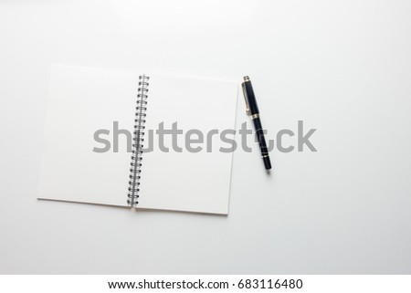 Minimal work space - Creative flat lay photo of workspace desk with sketchbook and wooden pencil on copy space white background. Top view , flat lay photography.