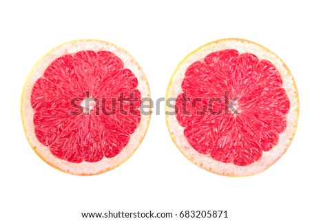 Halves of grapefruits, isolated on a white background. Citrus fruits for healthy snack. Slice of ripe and bright red grapefruit. Two fresh, organic, exotic and juicy grapefruits full of vitamins. 