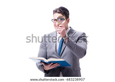 Businessman reading with magnifying glass isolated on white back