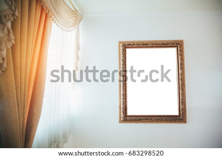 White frame with cement wall By the window with light.