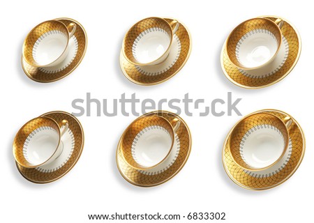 Six golden cups with saucers for tea and coffee (with clipping path)