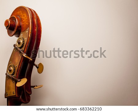 Photo of violin close-up. Close-up of cello strings, classical music concept. Detail of a violin. The musical instrument "violin".