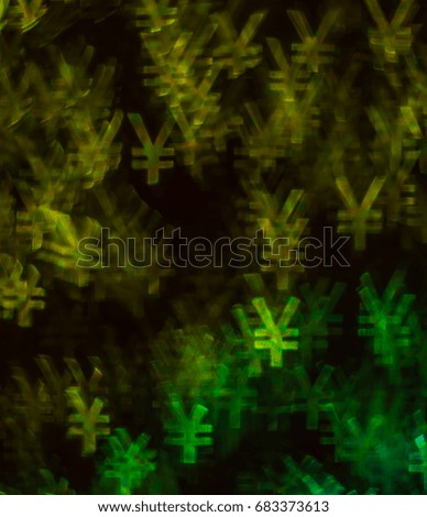 Beautiful background with different colored yen , abstract background, yen  shapes on black background, blurry