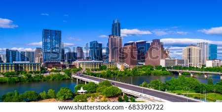 Austin Texas skyline during mid-day sunny summer perfect blue sky with entire city scape office buildings capital cities cityscape auditorium shores Panoramic Royalty-Free Stock Photo #683390722