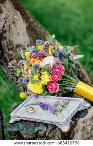 Wedding bouquet on wood at spring or summer.