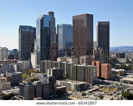 Downtown Los Angeles towers and apartments on a clear winter day.
