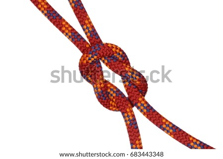 red rope with crossing knot on isolated background