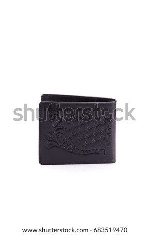 One purse,clutch genuine leather with embossing ,black brown colors,Fashionable men's accessory To store money on a white background