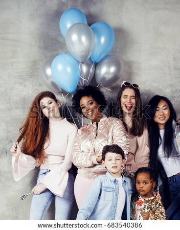 Lifestyle and people concept: young pretty diversity nations woman with different age children celebrating on birth day party together happy smiling, making selfie. African-american, asian and