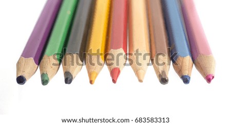 colored pencils on white background