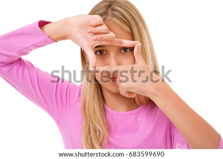 Picture of lovely young girl creating a frame with fingers.White background
