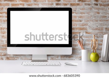 Mock up : Comfortable workplace with modern desktop computer. Blank screen for graphic display montage.