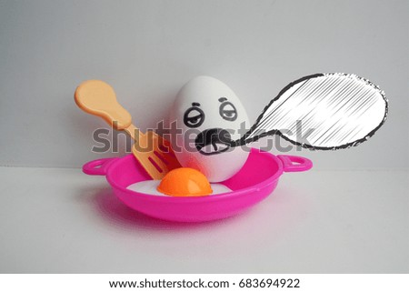 Eggs with face. Concept of the fear of death. Photo for your design. The cloud of thought is white. Place under the text.