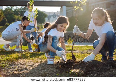 Adolescents working in volunteer group Royalty-Free Stock Photo #683779825