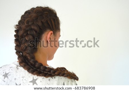 Hairstyle braiding on medium length Royalty-Free Stock Photo #683786908