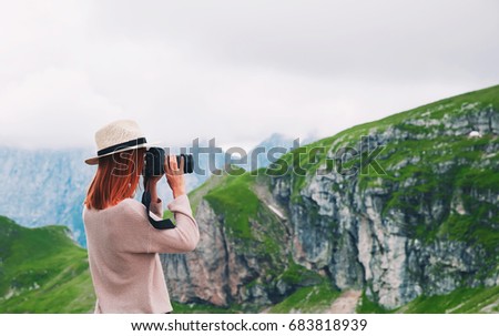 Traveler or hiker in the mountains. Mangart is a mountain in the Julian Alps, located between Italy and Slovenia. Travel, Freedom, Lifestyle concept.