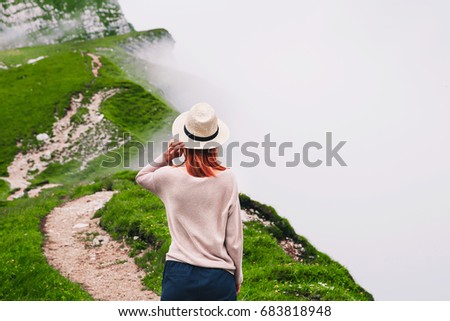 Traveler or hiker in the mountains. Mangart is a mountain in the Julian Alps, located between Italy and Slovenia. Travel, Freedom, Lifestyle concept.