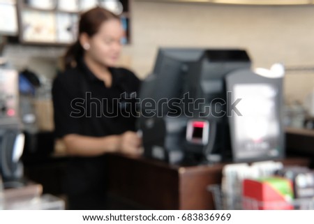 Blur background of barista at coffee shop 
