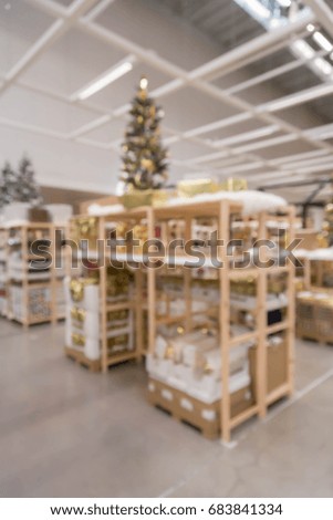 blur picture background of  Christmas and new year display showroom in furniture mall 
