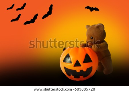 Teddy bear and pumpkin Halloween On an orange background, black bat, happy halloween