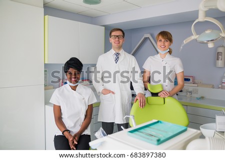 Portrait of a team of dentists in the clinic