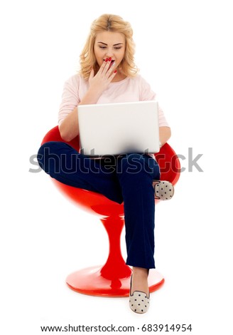 Amazed teen girl with laptop