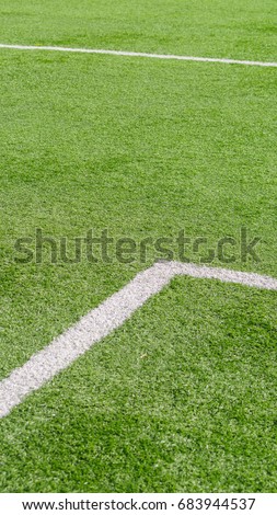 Close-up of artificial turf, Soccer or football grass field, vertical image good for mobile phone wallpaper or user lock background. 