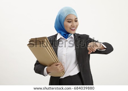 malay business woman holding stack documents happy 