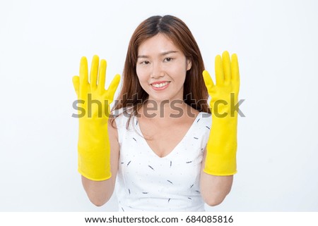 Smiling Asian Woman Showing Protective Gloves