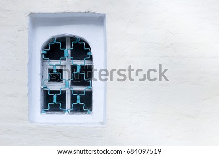 lattice window, white stone wall,