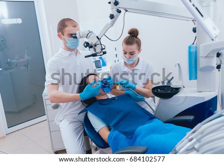 Medicamentous treatment of root canals during endodontic treatment. Modern technology Royalty-Free Stock Photo #684102577