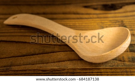 Unique Wooden Spoon Ladle Over Wooden Background