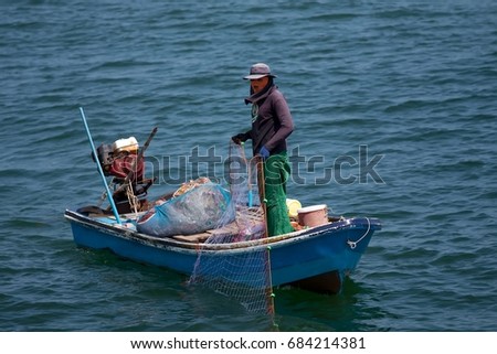 Fisherman Fishing Nets,Andaman Sea off the coast,  