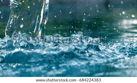 Water Splash background / Water is a transparent and nearly colorless chemical substance that is the main constituent of Earth's streams, lakes, and oceans, and the fluids of most living