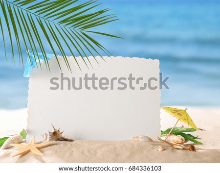 Blank card with sea shells on beach. Summer vacation concept