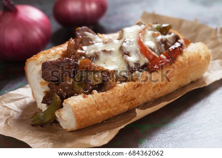 Philly cheese steak sandwich served on parchment paper Royalty-Free Stock Photo #684362062
