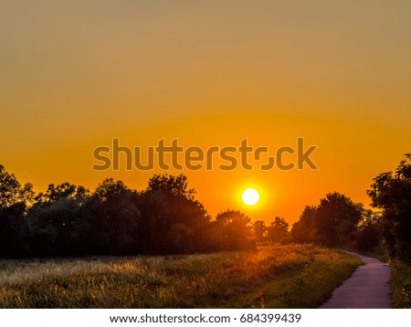 Sunset over trail or path