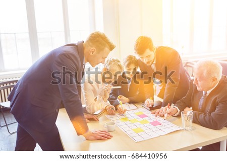 Teamwork training in teambuilding workshop in business conference room Royalty-Free Stock Photo #684410956