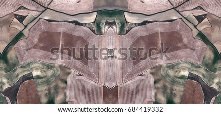 Signs in a field of work,Abstract Symmetrical Photographs of Spain fields from the air ,artistic representation of human labor camps bird's eye view,  abstract  surreal, expressionist