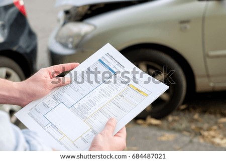 Accident statement paper used after a car accident Royalty-Free Stock Photo #684487021