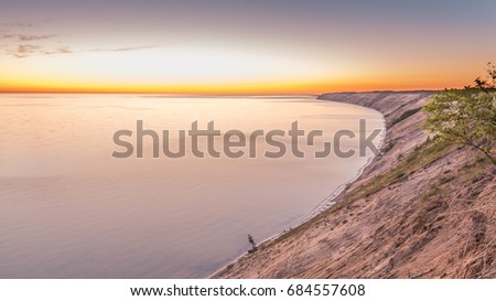 Dawn breaks at Grand Sable Dunes on Lake Superior, in Pictured Rocks National Lakeshore, near Grand Marais, Michigan.