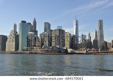 Downtown Manhattan across the River Royalty-Free Stock Photo #684570061