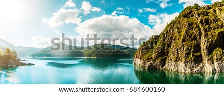 wonderful sunny landscape. mountain lake with perfect sky glowing in sunlight. Creative image. Beauty in the world.